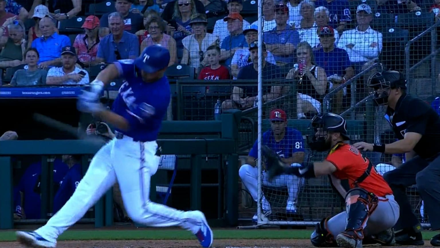 Corey Seager finishes his swing in a Texas Rangers uniform