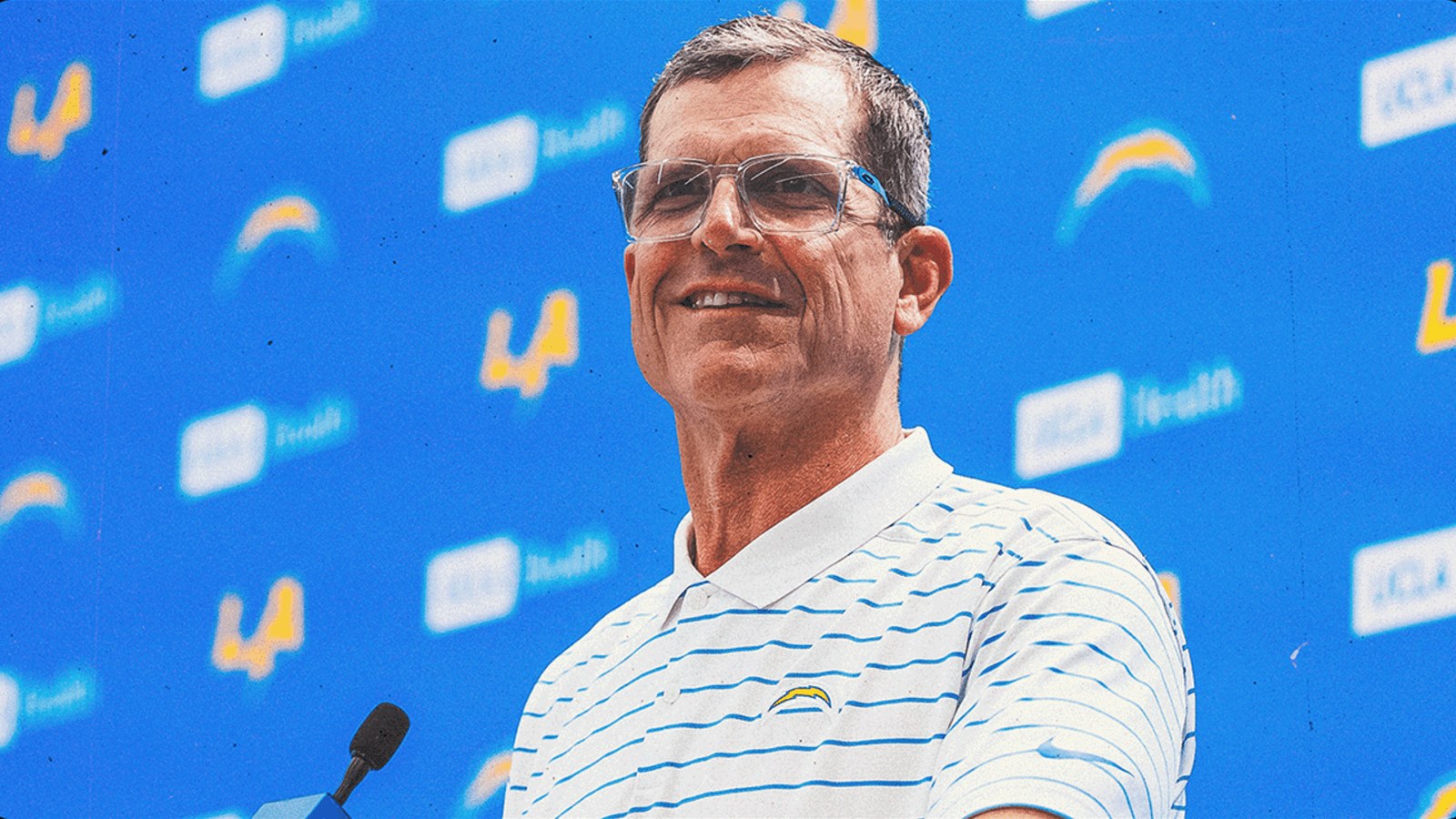 Chargers head coach Jim Harbaugh at a training camp press conference