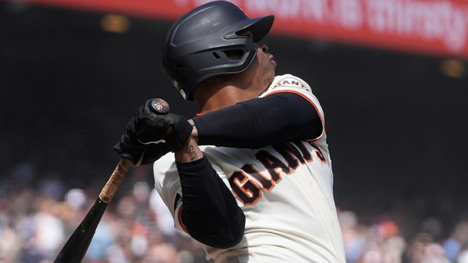 Rafael Devers follows through on a swing at Oracle Park