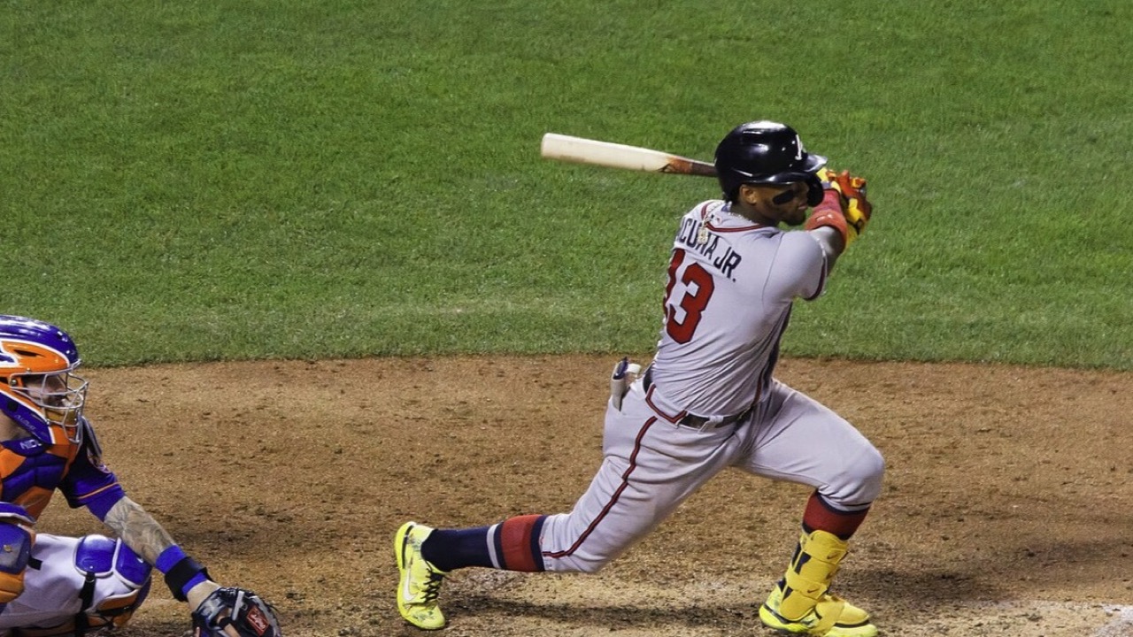 Ronald Acuña Jr. finishes his swing against the Mets