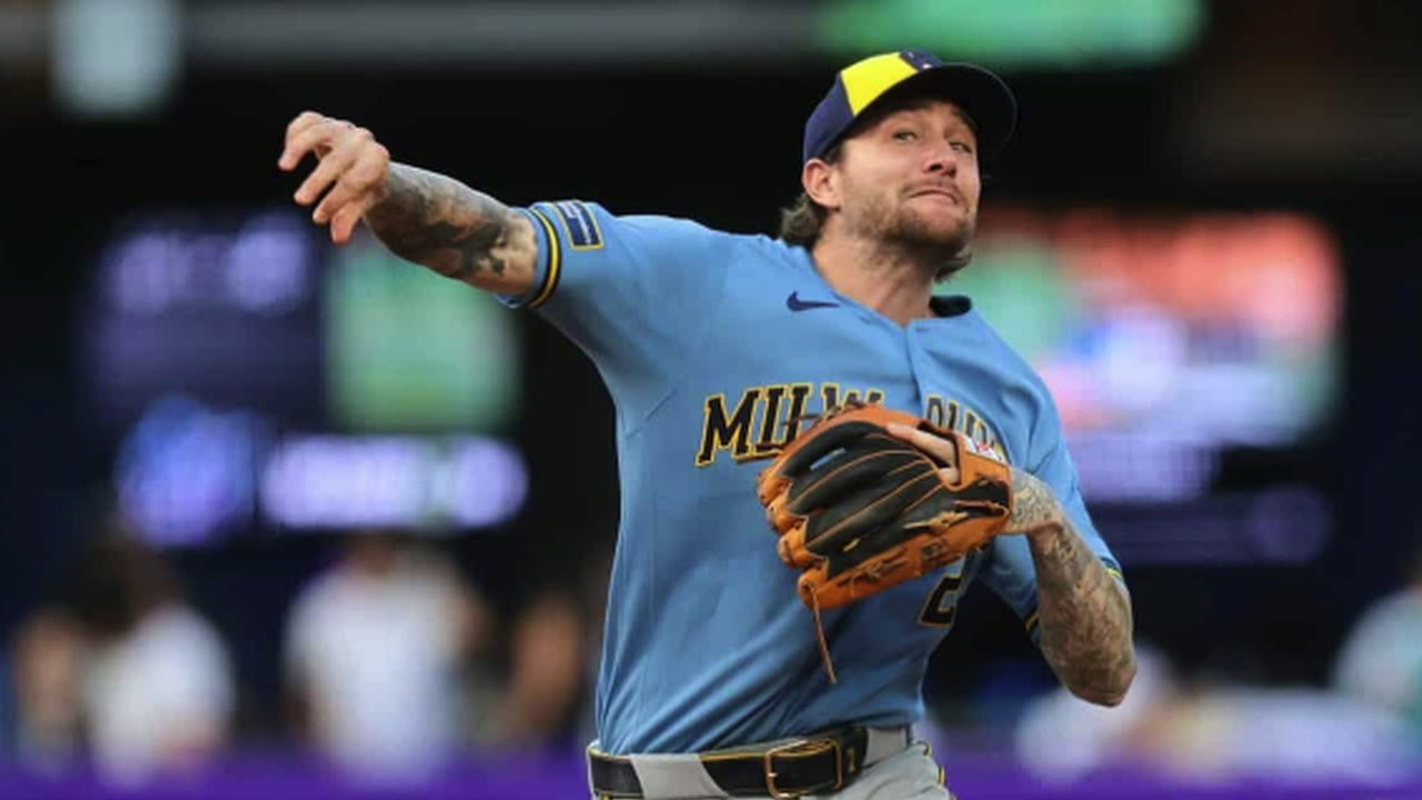 Milwaukee Brewers infielder makes a throw