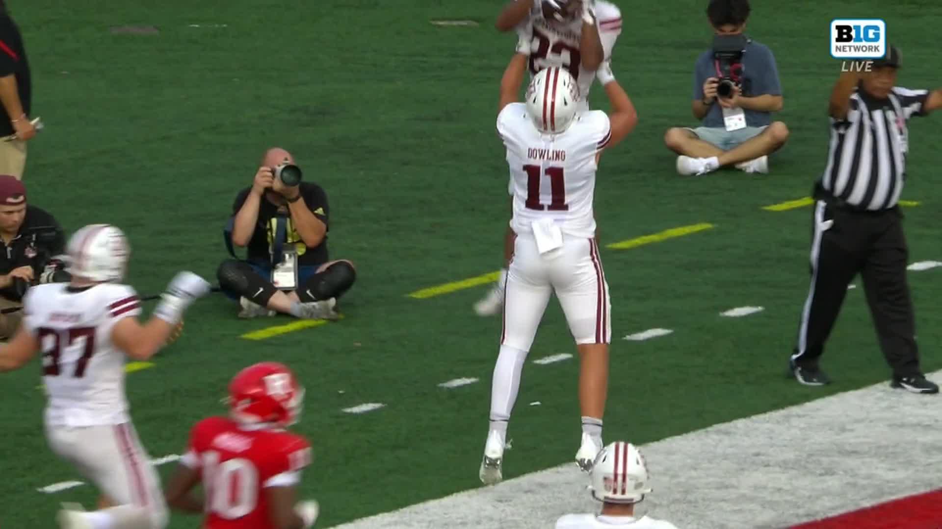 UMass celebrates a touchdown in the end zone at Rutgers